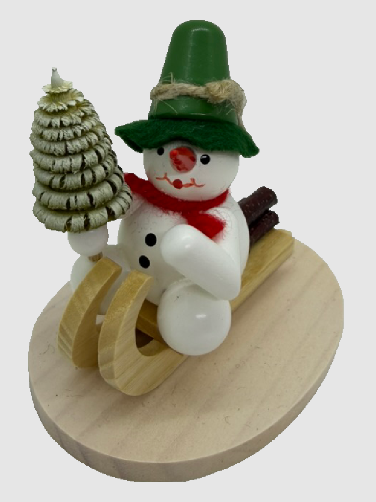 Schneemann auf Holzschlitten